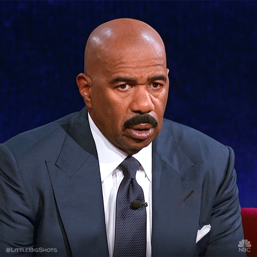 Celebrity gif. Comedian Steve Harvey stares in blank-faced shock with his mouth agape. 