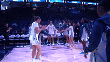 High Five Xavier University GIF by Xavier Women's Basketball