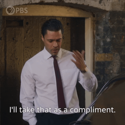TV gif. Olly Rix as Matthew Aylward on "Call the Midwife" looks down and gestures out at someone like he means what he says. Text, "I'll take that as a complement."