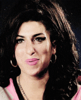 Amy Winehouse Shrug GIF