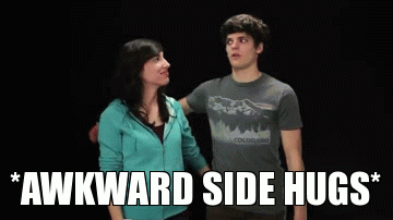 awkward hug GIF