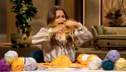 drew barrymore unraveling a ball of yarn