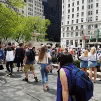 Anti-Trump Protesters March Past Manhattan's Plaza Hotel