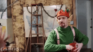 Throwing Christmas Elf GIF by zoefannet