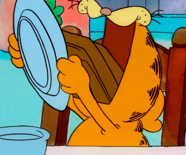 cat eating GIF by Garfield