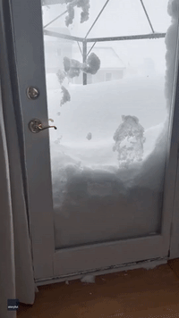 Lake-Effect Snow Builds Up Outside Erie County Porch