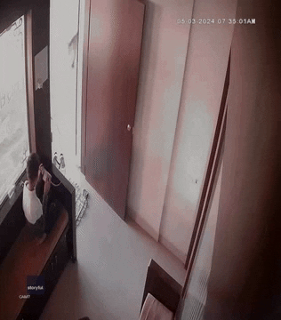 Escape Leopard GIF by Storyful