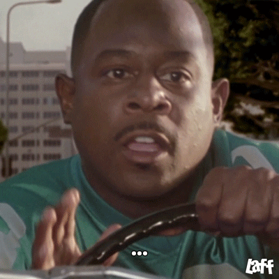 Movie gif. Clip shows Martin Lawrence in Black Knight as he sits at the wheel of a car and looks out at something ahead of him with an apologetic gesture and expression, saying, "Sorry!'