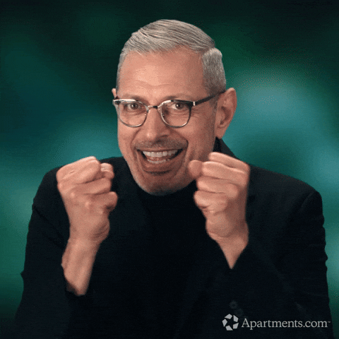 Ad gif. Jeff Goldblum in an ad for Apartments.com. He has his fists raised in front of his face and quivers with excitement, kind of looking like he needs to pee but is ecstatic about it. 