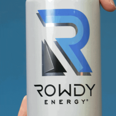 Ad gif. A person holds a can of Blue Raspberry Rowdy Energy by the bottom. They use their other hand to pull open the tab. Foam sprays out of the can and bubbles up out of the opening. 