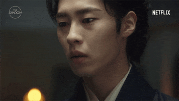 TV gif. Lee Jae Wook as Jang Uk in Alchemy of Souls looks sad and blank, and he blinks as tears drip down his face.