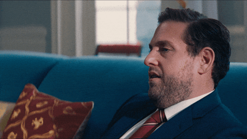 Film gif.  Jonah Hill als Jason in Don't Look Up rolt met zijn ogen en laat zijn hoofd achterover vallen alsof hij gestrest op de bank ligt.
