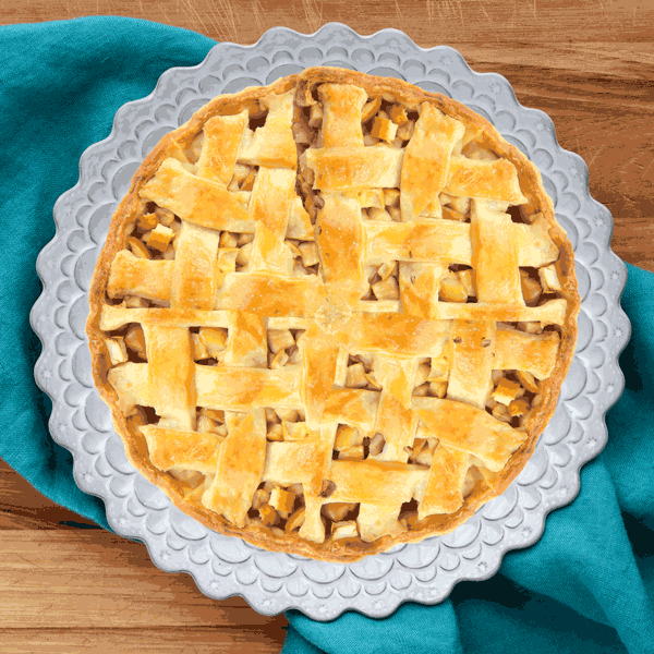 Digital art gif. From above, a full apple pie disappears piece by piece until it is all gone.
