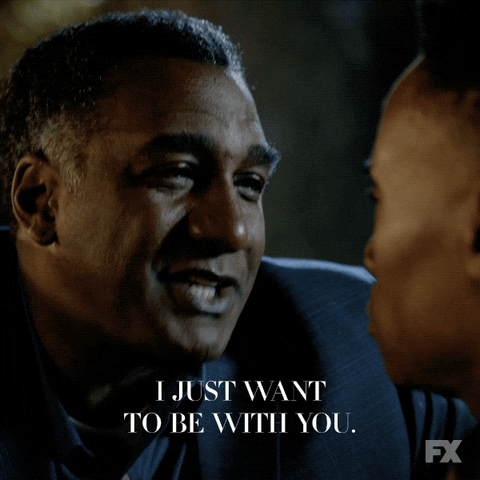 TV gif. Older man on Pose looks searchingly at a younger man, telling him, "I just want to be with you," which appears as text.