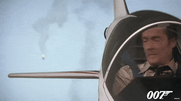 Flying Roger Moore GIF by James Bond 007