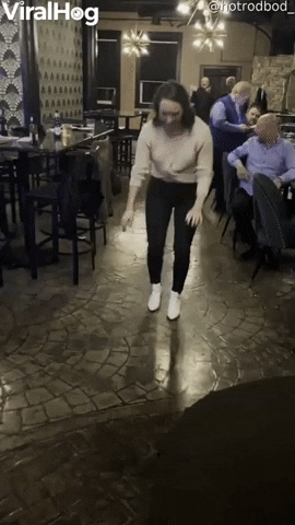 Man Gets Whacked By Woman Doing The Worm GIF by ViralHog