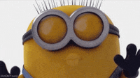 Movie gif. A minion from Despicable Me smiles as he pulls himself close to us. He makes a kissy face and closes his eyes as he kisses us.