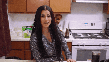 smirk vogue cardi b pleased told you so GIF