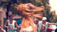 music video hair flip GIF