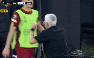 Sports gif. Jose Mourinho paces down the sidelines waving a finger in the air like he's chasing someone down or walking full speed away from a frustrating conversation.
