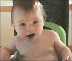 Video gif. Baby in a highchair makes a disgusted face and winces as if they just ate something sour.