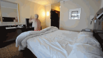 bed jumping GIF