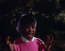 TV gif. Ola Ray as Michael Jackson’s girlfriend in the Thriller video screams in terror, her hands shaking in fear.