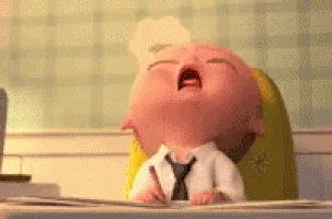 Movie gif. Boss Baby sits in his high chair with his head back as he sleeps lifelessly. His tongue is falling out of his mouth and his eyes are rolled back. His big head rolls around and falls flat onto the table, jerking him awake. He’s now back in business, like he was never asleep, and picks up his file to read it better.