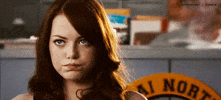 Movie gif. Emma Stone as Olive Penderghast in Easy A looks up and vibrates her lips in boredom. She then rolls her head and her eyes, annoyed.
