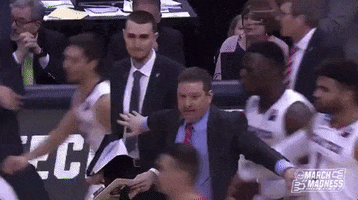 Holding Back College Basketball GIF by NCAA March Madness