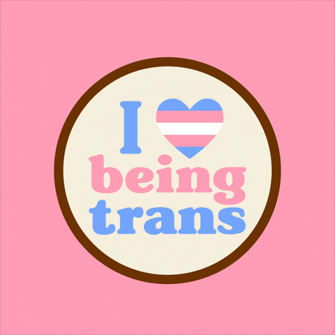 Illustrated gif. Circular ivory badge with a brown border bobs on a bubble gum pink background. Pastel pink and blue text reads, "I heart being trans," with a striped heart reminiscent of the trans flag.
