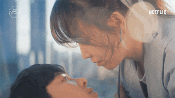 TV gif. Closeup of Seo Hyun-jin as Kang Da-jeong and Kim Dong-wook as Ju Yeong-do in You Are My Spring as they go in for a slow kiss.