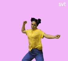 Video gif. Woman with hair in two side buns waves her fists around her head and shakes her hips like she's hitting the moves hard. SVT appears in the top right corner.