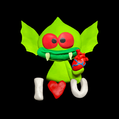 Digital art gif. A fanged green creature with bat wings as ears holds a beating human heart in its claws and smiles at us. Text, "I heart U."