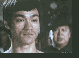 Bruce Lee Laughing GIF