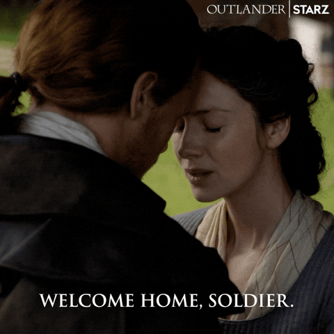 TV gif. Caitriona Balfe as Claire and Sam Heughan as Jamie in Outlander. Their foreheads are touching as they embrace and Claire's eyes are closed as she says, "Welcome home, solider."