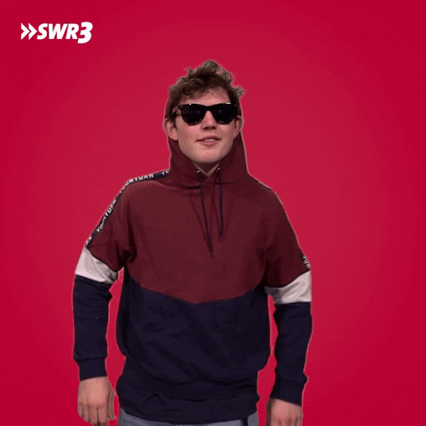 Ad gif. Wearing sunglasses and a hoodie, Marcel Bihl of SWR3 playfully places his hands on his waist, smiles and flips his hand up to wave.