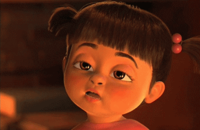 Movie gif. A closeup of a sleepy Boo from Monsters Inc blinking at us.
