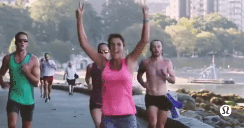 A GIF of people running along the seawall.