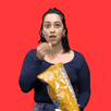 Latinx person shocked while eating chips.