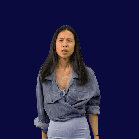 Video gif. Woman leans towards us in front of a navy blue background, pulling a megaphone up to her mouth and squinting her eyes, yelling. Above her, a shouting speech bubble reads in decorative, bold text, “Don’t fear their lies, vote!”