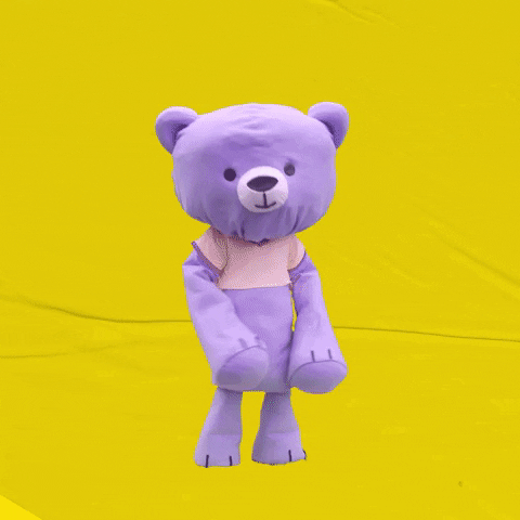 Video gif. A purple teddy bear steps one foot forward and gestures towards us. Text, "Enjoy the weekend."