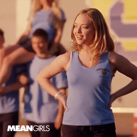 Movie gif. Amanda Seyfried as Karen in Mean Girls. She's on the sports field and is preparing to catch a ball that is getting tossed to her. She misses the ball but it hits her breasts instead, and they comically bounce off her and fall to the floor as she fumbles.
