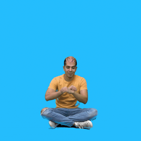 Video gif. Hip young man sitting cross-legged on a cyan blue background makes an arc above his head with his arms, revealing a rainbow that reads, "Shop local."