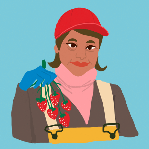 Digital art gif. Farmworker dangles a branch of strawberries from her hand, smiling.