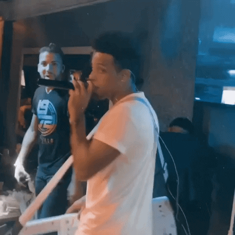 abelxanders singing mic stage live music GIF