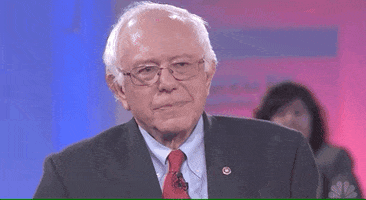 TV gif. Senator Bernie Sanders during a debate looks up and rolls his eyes mockingly, exclaiming “Oh!”