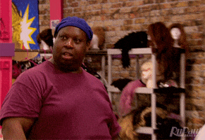 Reality TV gif. We zoom in on a barefaced Latrice Royale, who appears completely clueless.