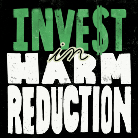 Text gif. Oversized block letters reading "Invest in harm reduction," with a dollar sign in place of the S against a dark background.