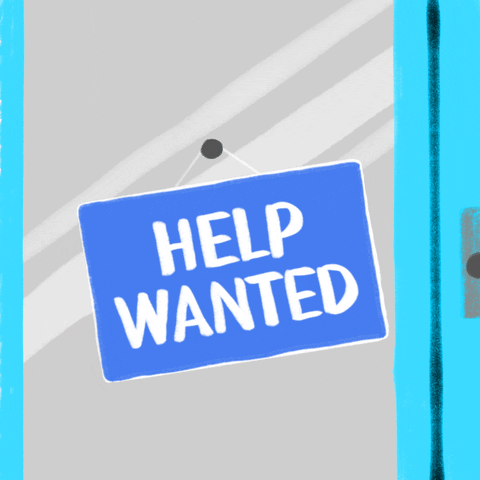 Digital art gif. Blue sign swings on a hook over a glass window background. One side says, “Help wanted.” The sign flips and reads, “Election workers needed in North Carolina.”